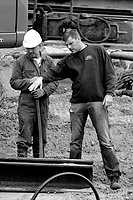 Foreman instructing worker
